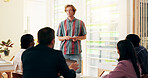 Confident, speech and man in classroom, education and notes for presentation in college or communication. Happy, speaker and person with info for assignment, talking and learning in university