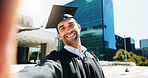 City, graduation and selfie of man student outdoor for celebration or education event. Future, scholarship and social media with happy college or university graduate in urban town for profile picture