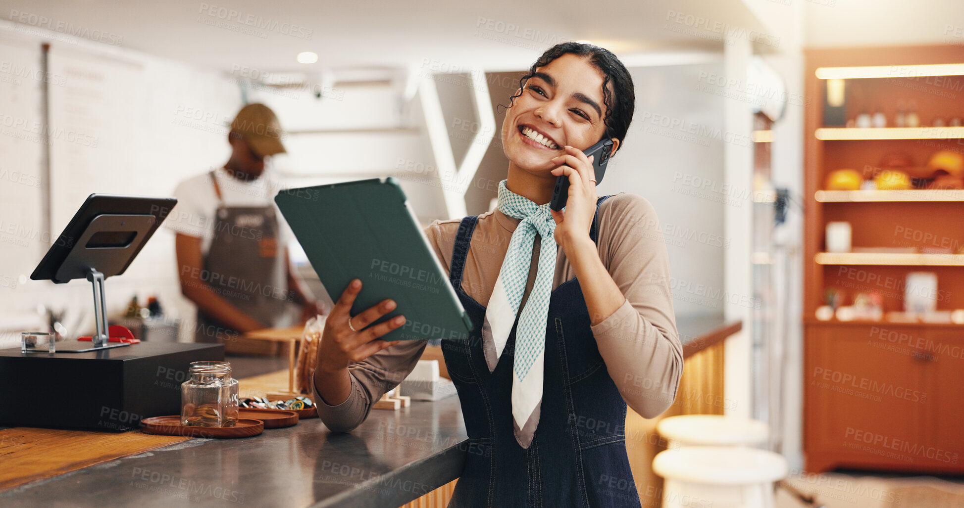 Buy stock photo Tablet, phone call and smile with woman in cafe for inventory checklist, restaurant stock order and small business. Hospitality, store and menu planning with person in coffee shop for online sales
