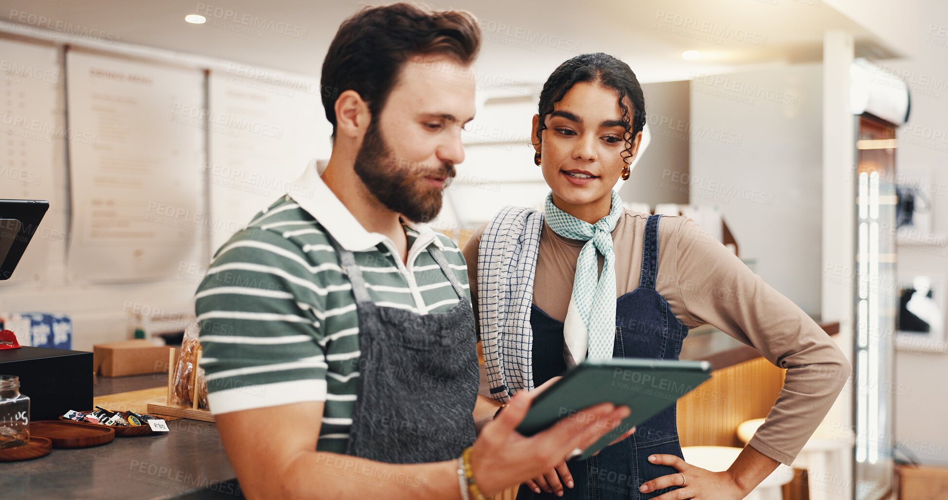 Buy stock photo Tablet, team and planning with people in cafe for online critic update, restaurant review and small business. Customer experience, reading and menu rating with man and woman in coffee shop with app