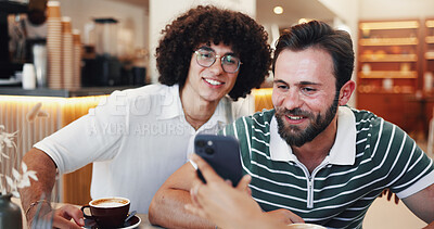 Buy stock photo Men, friends and check phone at cafe for research, browsing social media and showing dating app. People, smile and mobile with coffee for reunion, reading blog and gossip website and bonding at shop