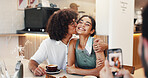 Couple, happy and kiss in picture in restaurant for coffee date memory, relationship support and social media post. Gen z people, smile and photography in cafe for bonding, romance and connection
