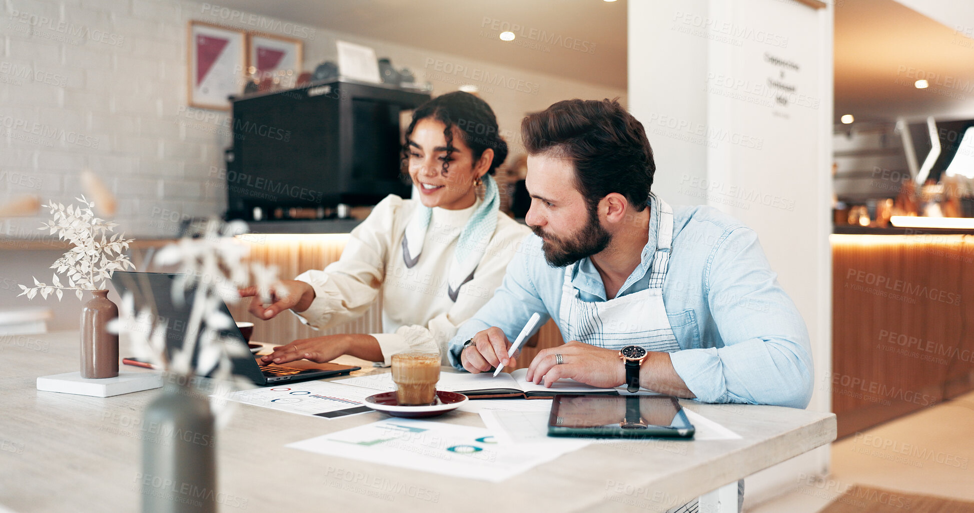 Buy stock photo Business woman, laptop and discussion in cafe for review, social media and retail management. Owner, team meeting and coffee shop investor for sales graph, restaurant profit or hospitality startup