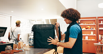 Buy stock photo Food delivery, pickup and bag with man in cafe for online order, ecommerce and courier package. Restaurant takeaway, hospitality and bakery checkout with person in coffee shop for lunch parcel
