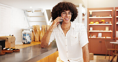 Buy stock photo Phone call, smile and man in cafe, chat and communication for date with tech, relax and retail. Laughing, customer and person with mobile for conversation, happy and break in coffee shop or talking
