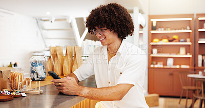 Buy stock photo Relax, phone and man with smile in cafe for research, restaurant website and social media. Funny meme, blog and happy person with mobile app in coffee shop for online menu, internet and news update