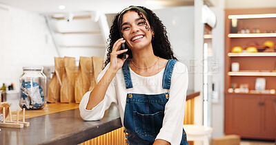 Buy stock photo Phone call, smile and woman in cafe, talking and communication for date with tech, relax and retail. Laughing, customer and person with mobile for conversation, happy and break in coffee shop or chat