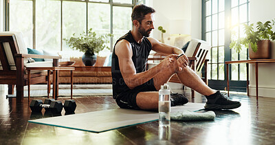 Buy stock photo Fitness, home and man with watch for exercise, training and cardio workout on yoga mat. Morning routine, pilates and person check time, heart rate and progress for health, wellness and performance