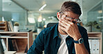Man, night and tired journalist in office with fatigue, deadline and burnout for article or project. Overworked reporter, journalism and exhausted writer with eye strain for story review and draft