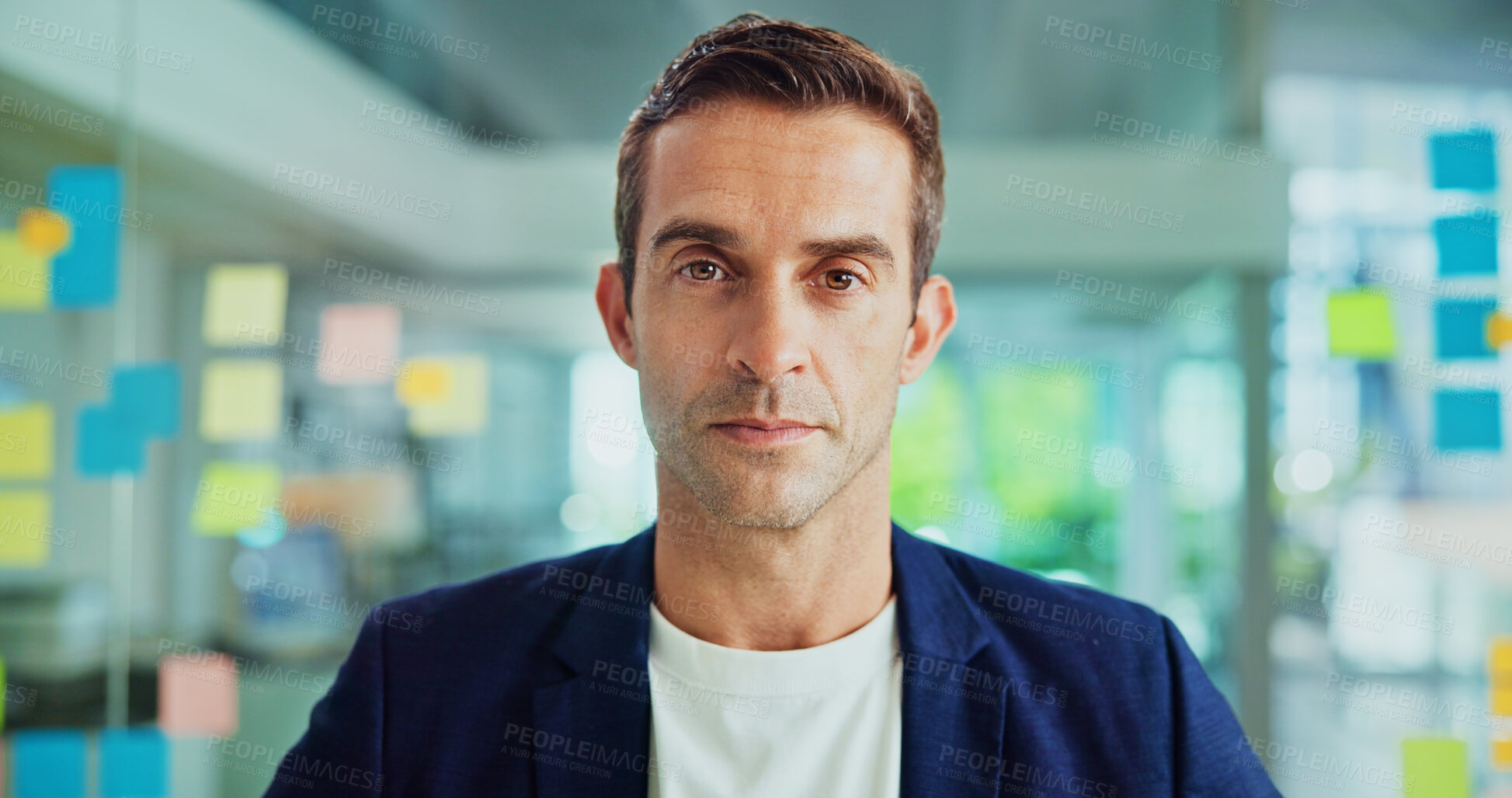 Buy stock photo Portrait, serious and business man by glass wall, project management or creative writer. Face, confident worker and entrepreneur, professional and magazine editor with sticky note in startup office