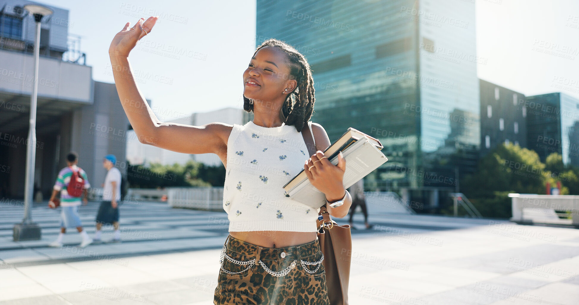 Buy stock photo University student, girl and books with greeting outdoor for hello, friendly interaction and respect. Education, black person and wave on campus for morning routine, study scholarship and learning