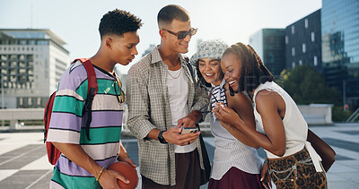 Buy stock photo Happy, friends and reading with phone in city for social media, notification and group bonding. Smile, people and streetwear fashion with mobile chat, gossip news and streaming video for holiday trip