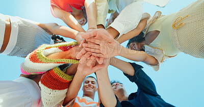 Buy stock photo Blue sky, below and hands stack of people in circle for support, solidarity and community outdoors. Diversity, students and group of friends with gesture for school, university and college connection