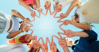 Buy stock photo Blue sky, below and hands of people with peace sign for support, solidarity and community outdoors. Diversity, students and group of friends with emoji in circle for school, university and college