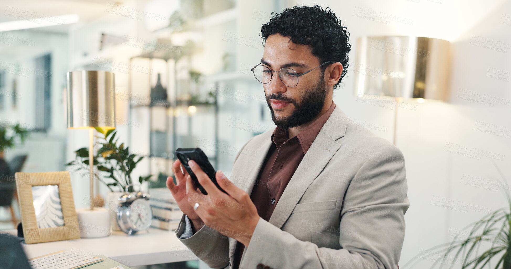 Buy stock photo Phone, professional and business man in office for online news, email networking and research. Corporate, company and person on smartphone for social media, internet and communication on break