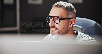 Buy stock photo Office, mature businessman and reading with computer for developer, software update and thinking. Night, male person and web designer with glasses reflection for digital agency, UX review or research