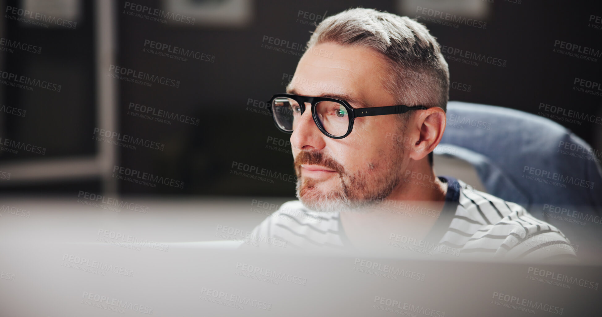 Buy stock photo Office, mature businessman and reading with computer for developer, software update and thinking. Night, male person and web designer with glasses reflection for digital agency, UX review or research