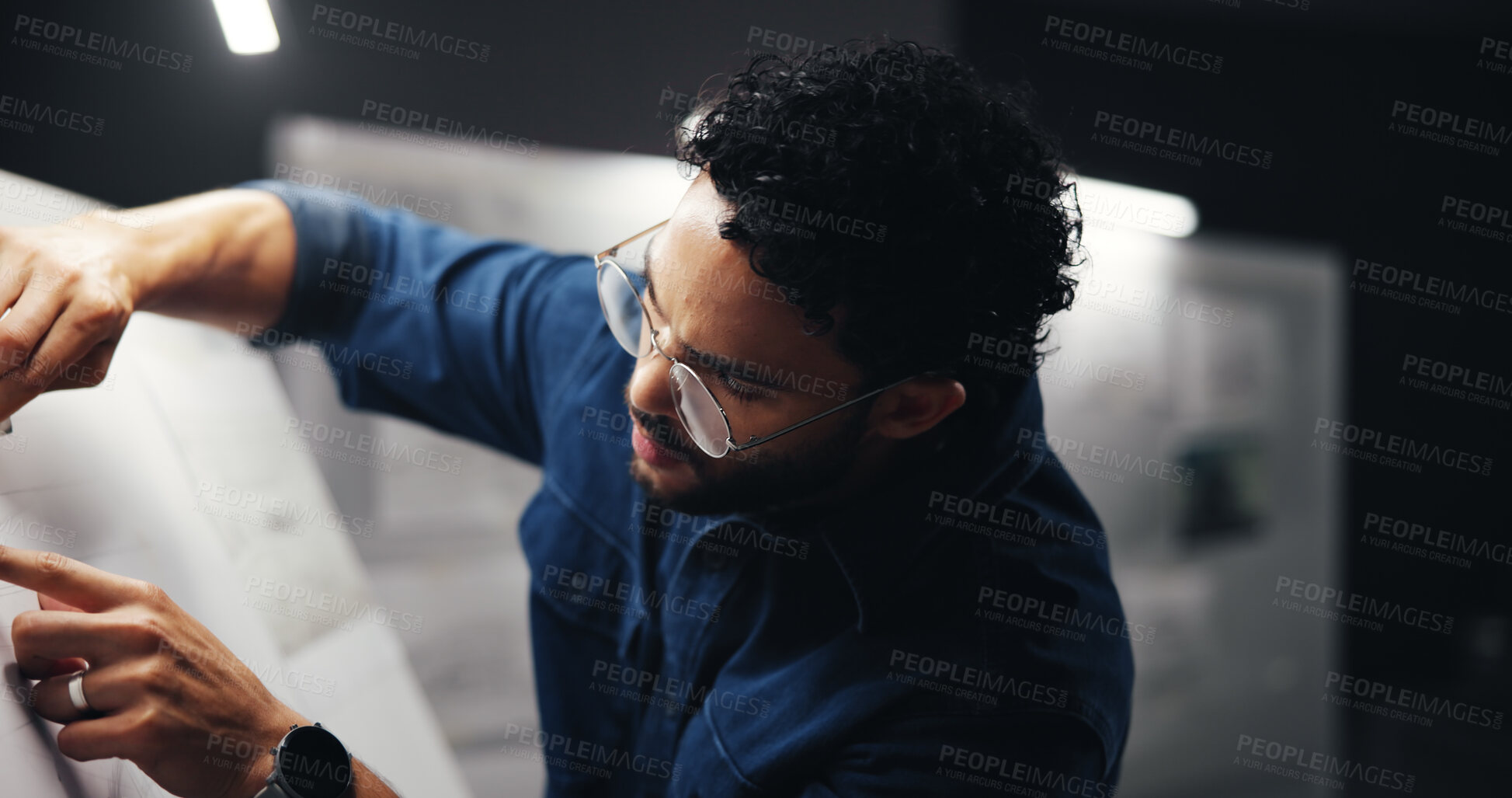 Buy stock photo Architect, man and paper on drawing board for floor plan, urban development project or building design blueprint. Night, deadline or person with sketching for property renovation and expansion layout