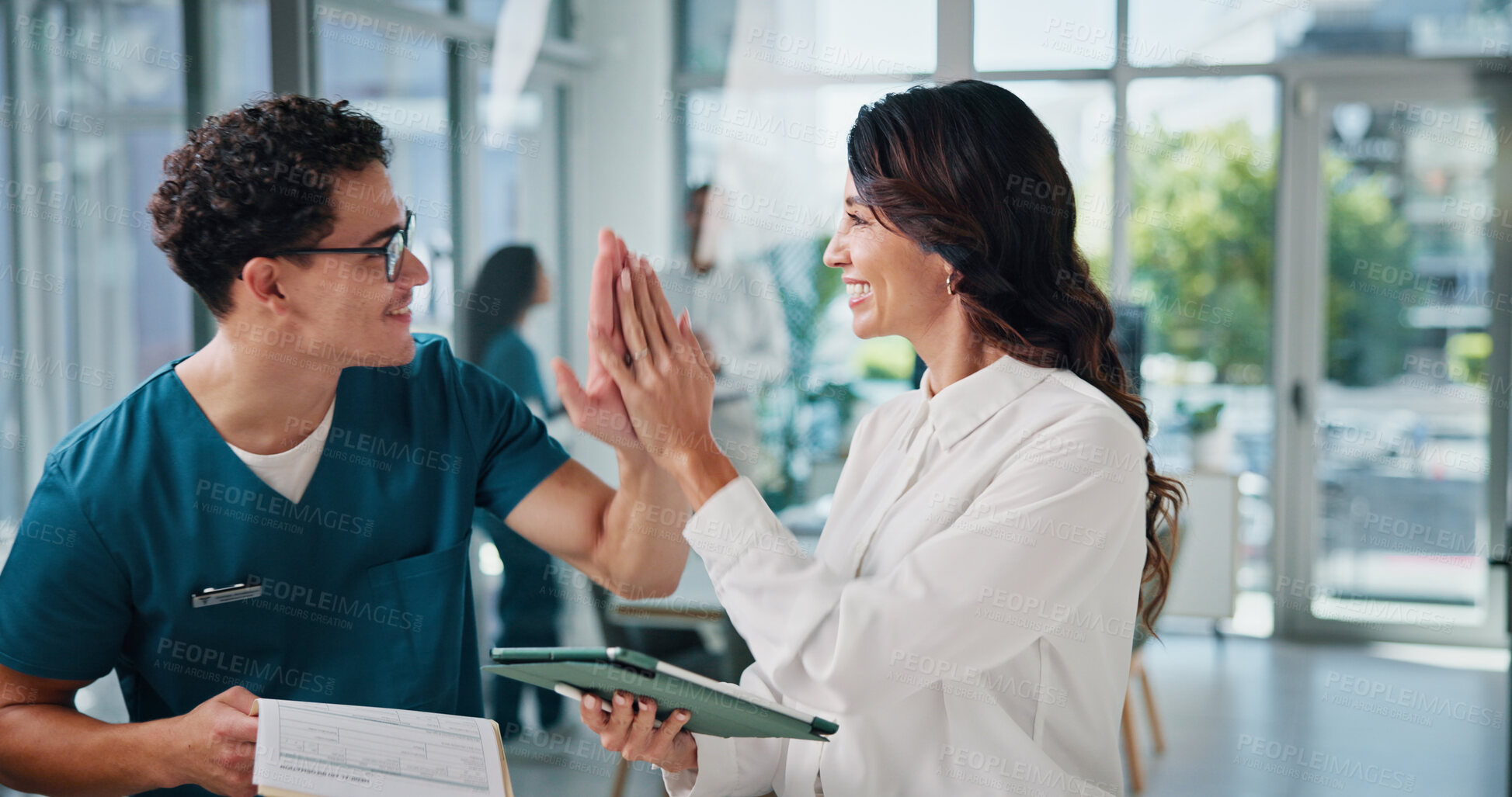 Buy stock photo Doctors, smile or high five in hospital, tablet or results with email for treatment funding. People, hand gesture or medical with professional, healthcare or tech with motivation, goals or support