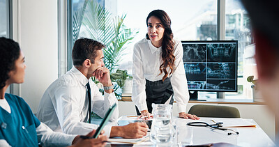 Buy stock photo Woman, doctor or discussion with x ray on screen for meeting or planning surgery in boardroom. Female person, speaker or medical team with CT scan or display for health exam, diagnosis or results