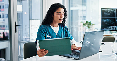 Buy stock photo Woman, nurse or reading with laptop or tablet for medical research, discovery or study at hospital. Female person, healthcare worker or employee with technology for telehealth or health app at clinic