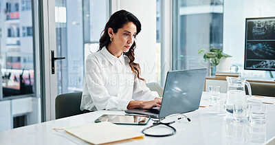 Buy stock photo Doctor, laptop and stethoscope with woman in hospital for cardiology, medical or telehealth. Computer, healthcare and typing report with professional in clinic for administration or management