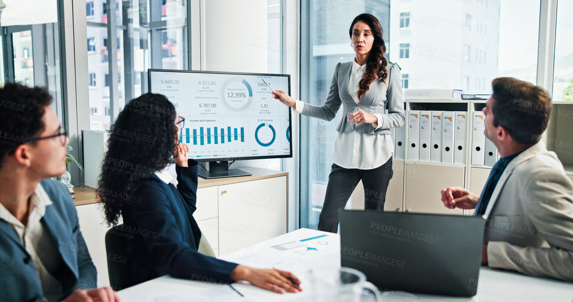 Buy stock photo Presentation, woman and discussion for data, business and collaboration for financial performance or online. Monitor, team and people with laptop for investment, accountant or colleagues in boardroom
