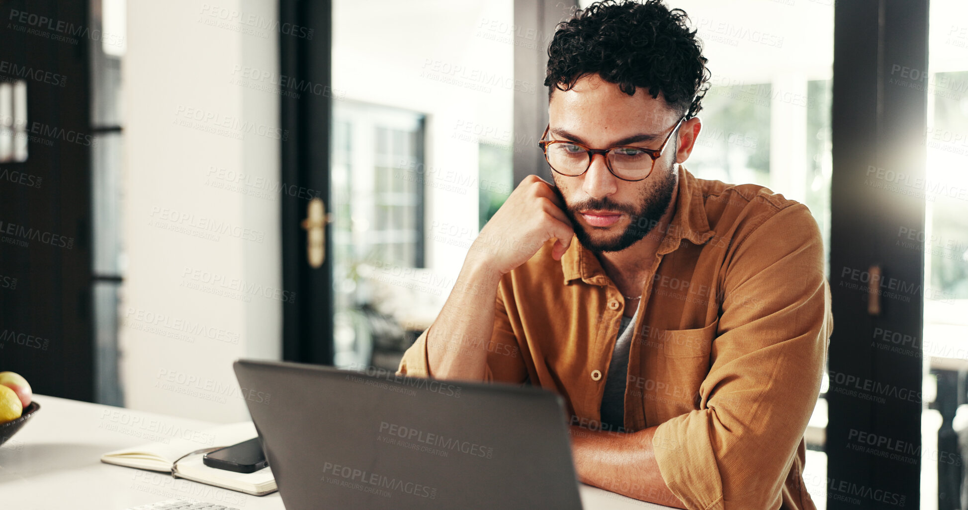 Buy stock photo Laptop, freelancer and man reading, thinking and accountant online for bookkeeping in home office. Computer, remote work and person planning, financial decision or problem solving for revenue audit