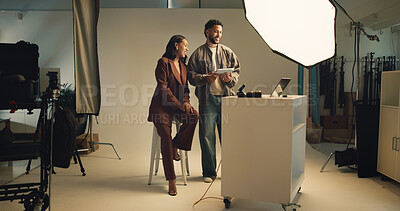 Buy stock photo Backstage, photography and tablet with people in studio together for discussion, photoshoot or planning. Creative, media or review with model and photographer on set for feedback or planning