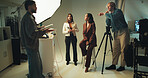 Makeup artist, model and photographer together in studio for discussion, photoshoot or planning. Backstage, creative and media with photography people on set for collaboration, conversation or review