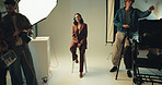 Photography, portrait and smile with model in studio for catalog or magazine photoshoot. Backstage, creative or media with happy woman on set for advertising, marketing or production campaign
