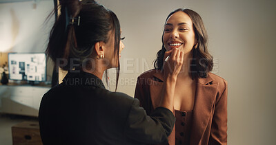 Buy stock photo Woman, model and beautician in studio for photoshoot, photography and interview production. Behind the scenes, touch up and makeup artist in media agency with cast, cosmetology and brand advertising