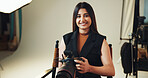 Smile, woman and photographer with portrait in backstage for photoshoot results, catalog and selection. Person, camera and career in photography, film production and editing picture in media industry