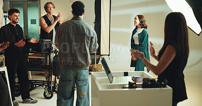 Buy stock photo Photoshoot, studio and applause with woman on set for creative, celebration and career. Media, production and female model with photography behind the scenes for fashion magazine cover in agency