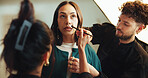 Photography, backstage and woman with styling team in studio for production, preparation or photoshoot. Creative, media and female model with makeup artist and hairdresser for magazine editorial.