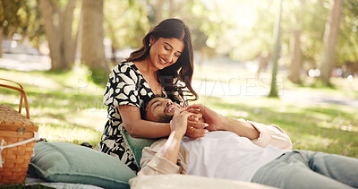 Buy stock photo Outdoor, embrace and couple on date, picnic and joke for conversation in nature, smile or relationship. Bonding, man and romance with woman on anniversary, laughing and people with commitment or park