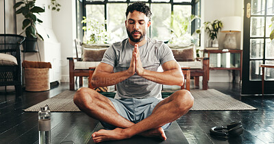 Buy stock photo Home, hands together and man with yoga, meditation and wellness with break, calm and relax. Person, yogi and guy in living room, awareness and resting with breathing, fitness and anjali mudra