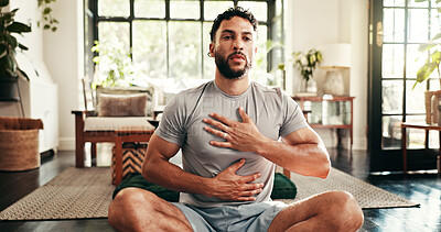 Buy stock photo Breathing, fitness and yoga with man in living room of home for health, pilates or wellness routine. Awareness, exercise and holistic with person on floor of apartment for balance or inner peace