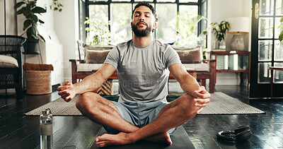 Buy stock photo Home, calm and man with yoga, meditation and fitness with break, chakra and relax. Person, yogi and guy in living room, wellness and rest with breathing, balance and lotus pose with pilates training