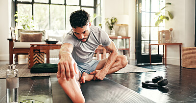 Buy stock photo Man, fitness and stretching in home for warm up, workout or exercise for training or leg muscle. Endurance, goal and athlete person for cardio, wellness and balance on floor with mat for challenge