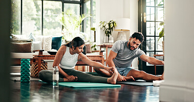 Buy stock photo Pilates, stretching and couple in home for exercise, workout and warm up for wellness, health and yoga. Morning, apartment and man with woman bonding for fitness, peace and flexibility in lounge