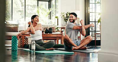 Buy stock photo Pilates, stretching arms and couple in home for exercise, workout and warm up for wellness, health and yoga. Morning, apartment and happy man with woman bonding for calm, peace and flexibility