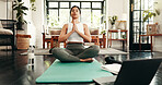 Balance, laptop and meditation with woman in living room of home for health, pilates or wellness routine. Computer, exercise and fitness with Indian person on floor of apartment for online course