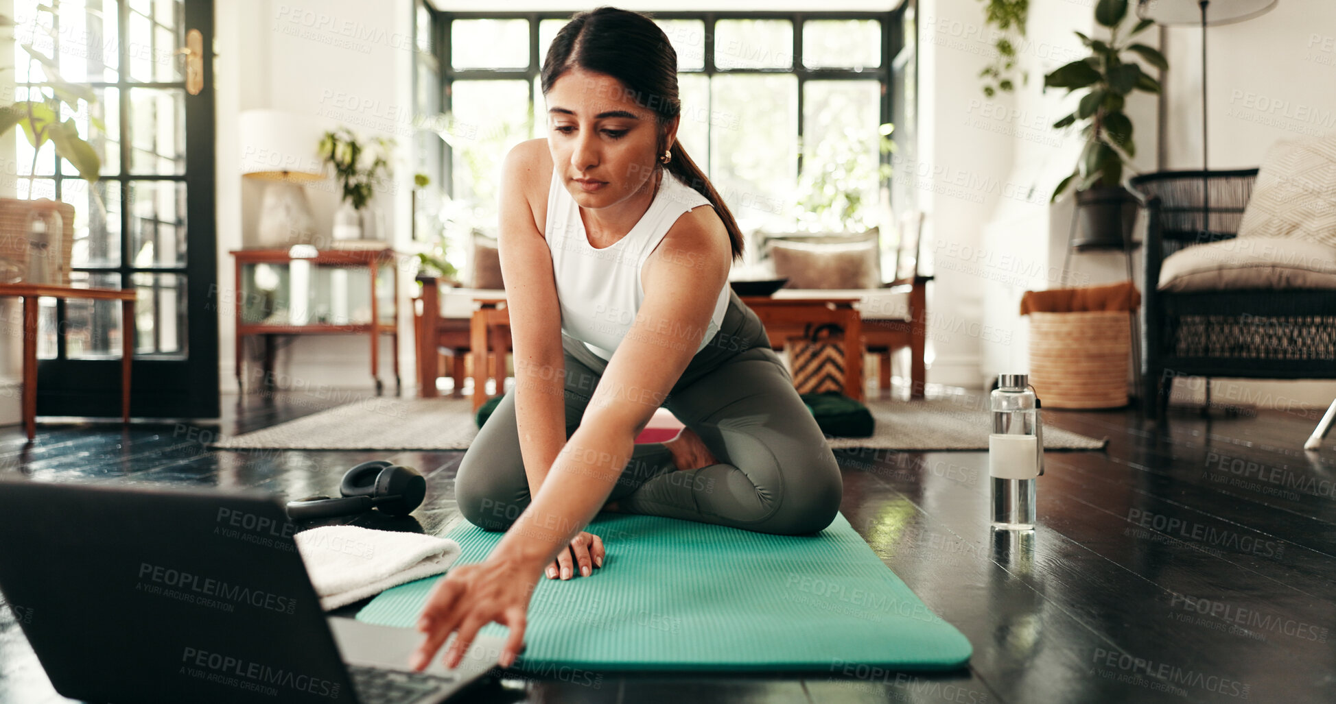 Buy stock photo Home, fitness and woman with laptop, meditation and calm with workout, balance and wellness. Person, connection and girl in lounge, computer or spine training with health, stretching or virtual class