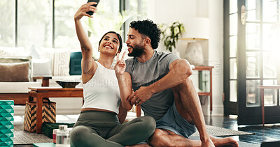 Buy stock photo Couple, selfie and love with fitness, living room and yoga mat for exercise, bonding and post on web blog. Woman, man and smartphone for memory, profile picture and social media on floor in home