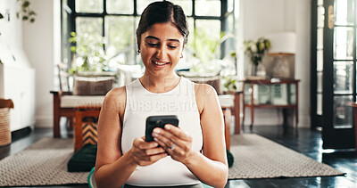 Buy stock photo Home, fitness and woman with smartphone, smile and internet with app to check progress. Person, apartment and girl in lounge, cellphone and exercise with website info for health, text or social media