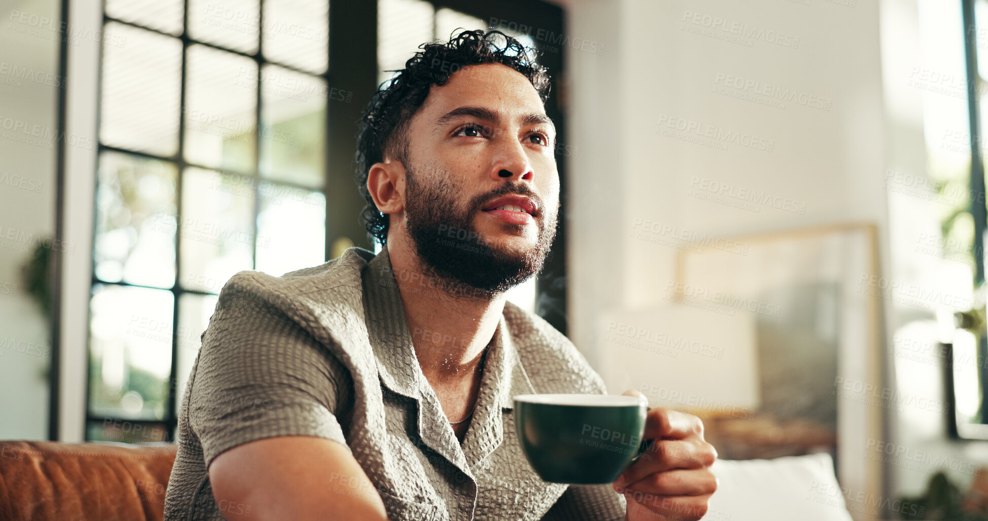 Buy stock photo Calm, thinking and coffee with man on sofa in lounge for reflection, relax and caffeine beverage. Inspiration, espresso and morning with person in living room at home for latte cup, drinking and idea