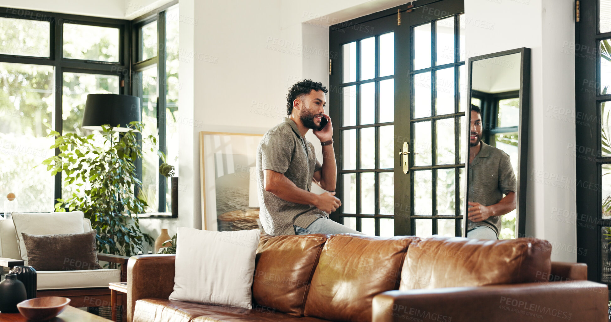 Buy stock photo Phone call, smile and talking with man at home for conversation, communication and contact. Networking, connection and speaking with person in living room of apartment for update, mobile and chat