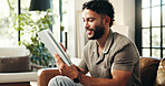Smile, relax and tablet with man on sofa in lounge for networking app, social media post and chat. Connection, download and update with person in living room of home for reading, scroll and update 
