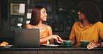 Handshake, laptop and talking with people in coffee shop together for first date, flirting or meeting. Computer, conversation or smile with man and woman shaking hands in cafe for hospitality